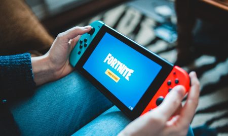 Family gaming together on the sofa
